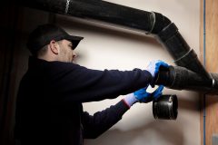 Contractor Installing Retro-DWS Internal Self-Regulating Tubular Heat Trace Cable System into Pipe